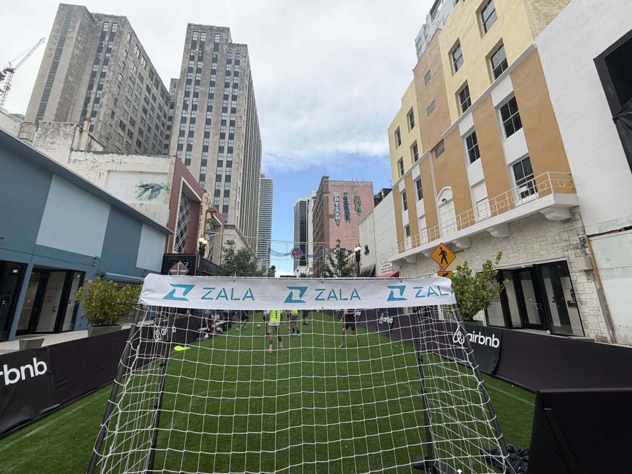 The ZALA banner strung over the Airbnb pop-up pitch in downtown Miami